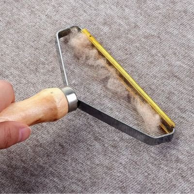 Brosse anti poil pour vêtement